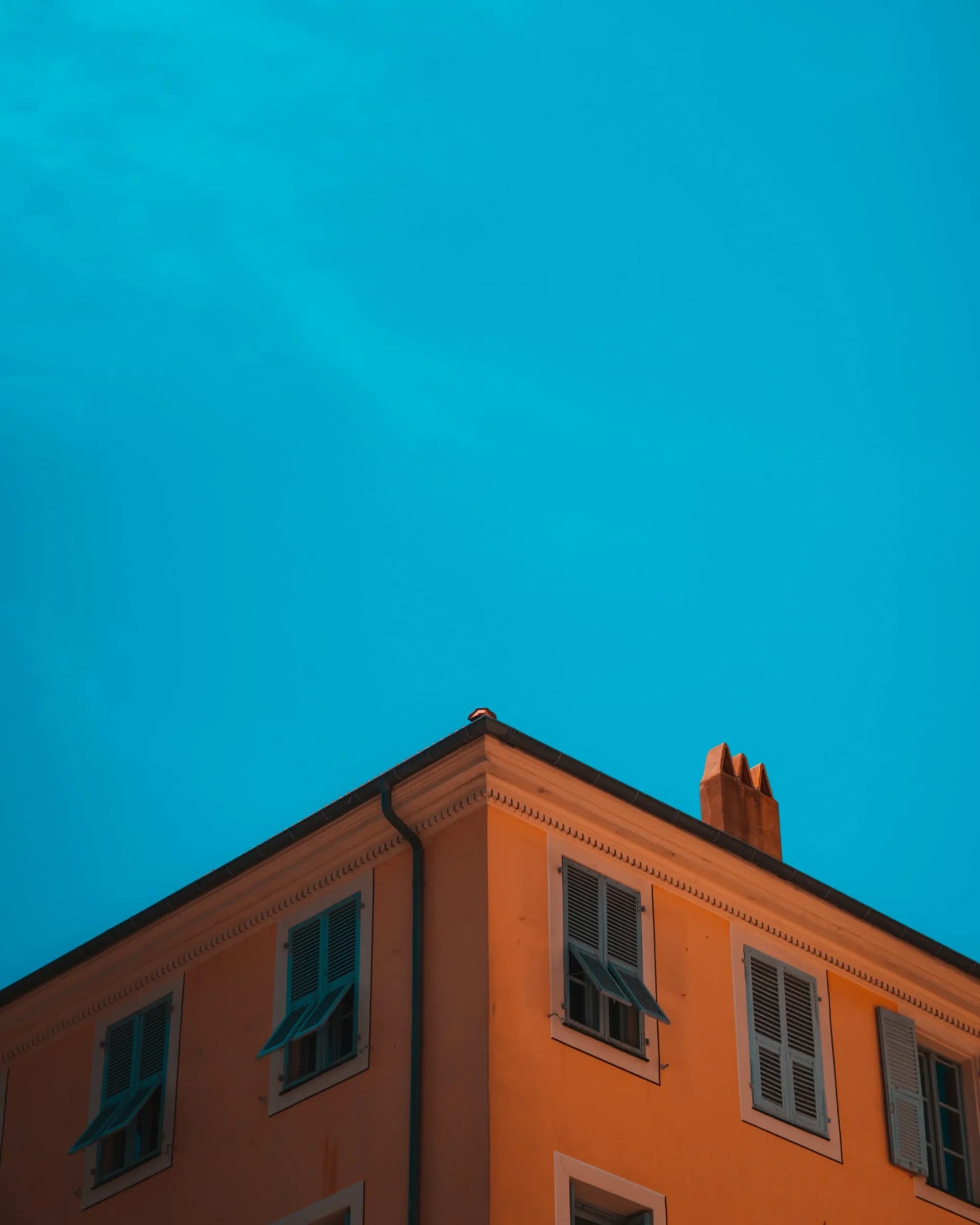 Yellow house with blue sky